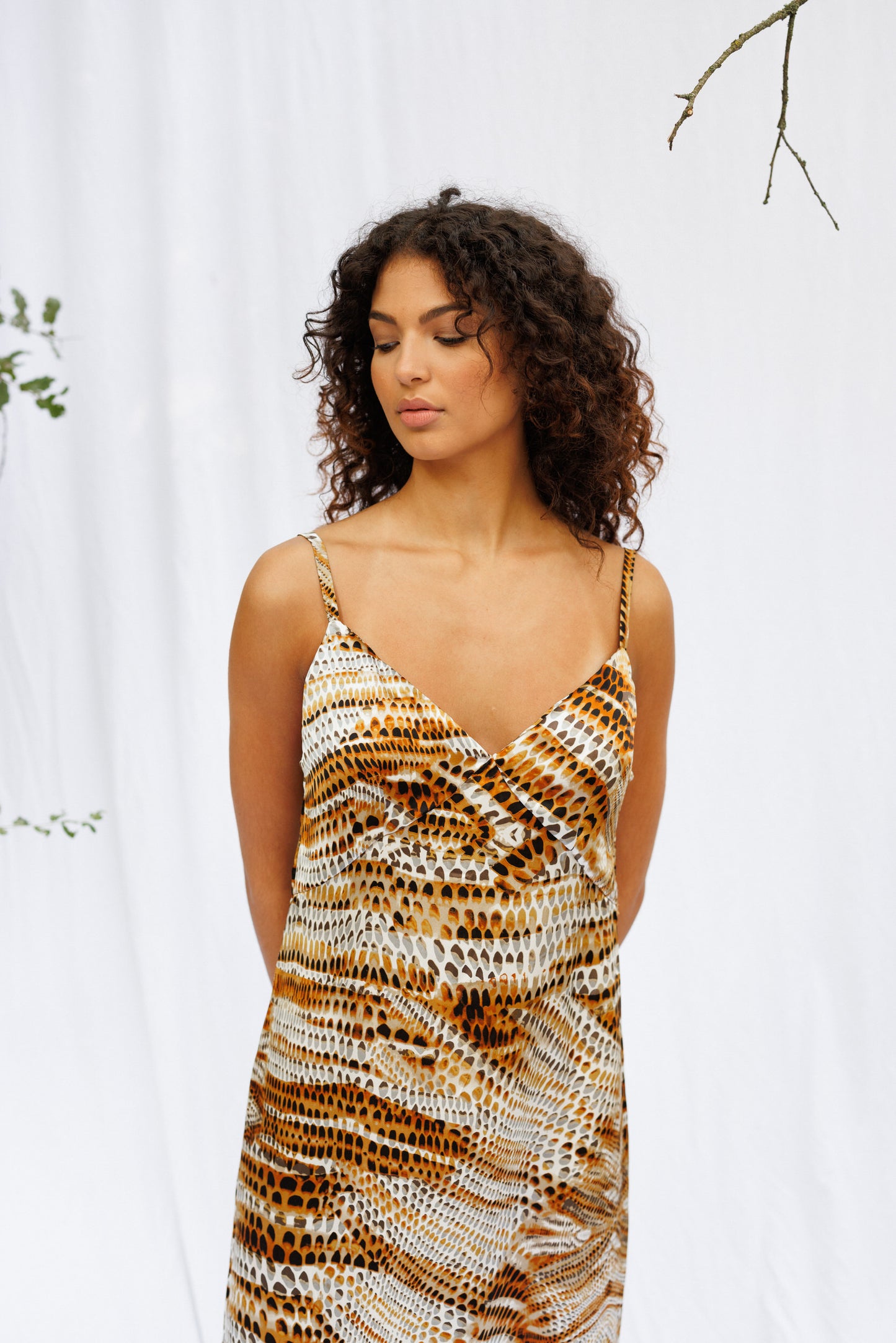 Close front image of Maria in a snake print slip dress