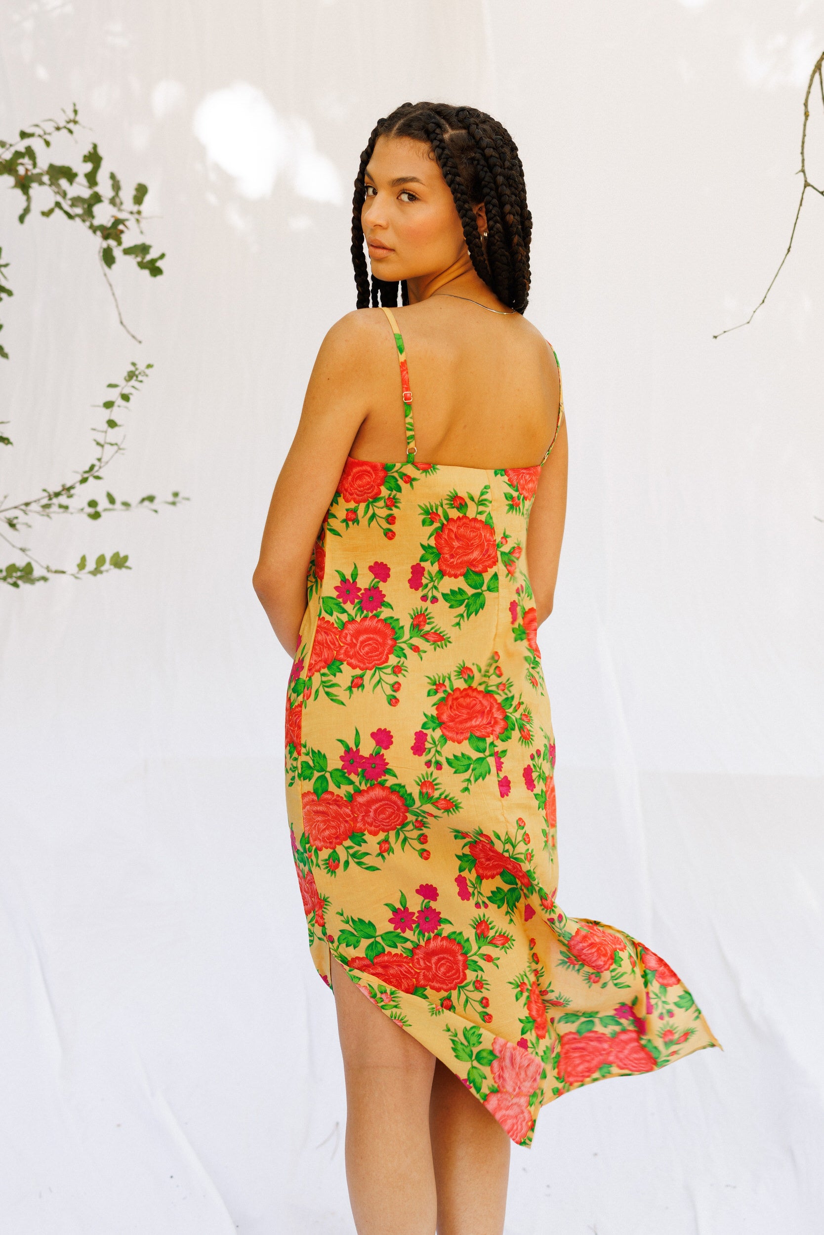 Back image of Maria wearing floral slip dress 
